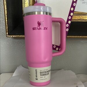 Stanley Pink Tumbler never used- has a small dent- couple of nicks c pics